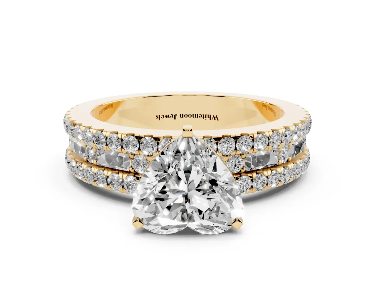 Heart Cut Diamond Solitaire Ring with Pavé and Channel Set Band Yellow gold