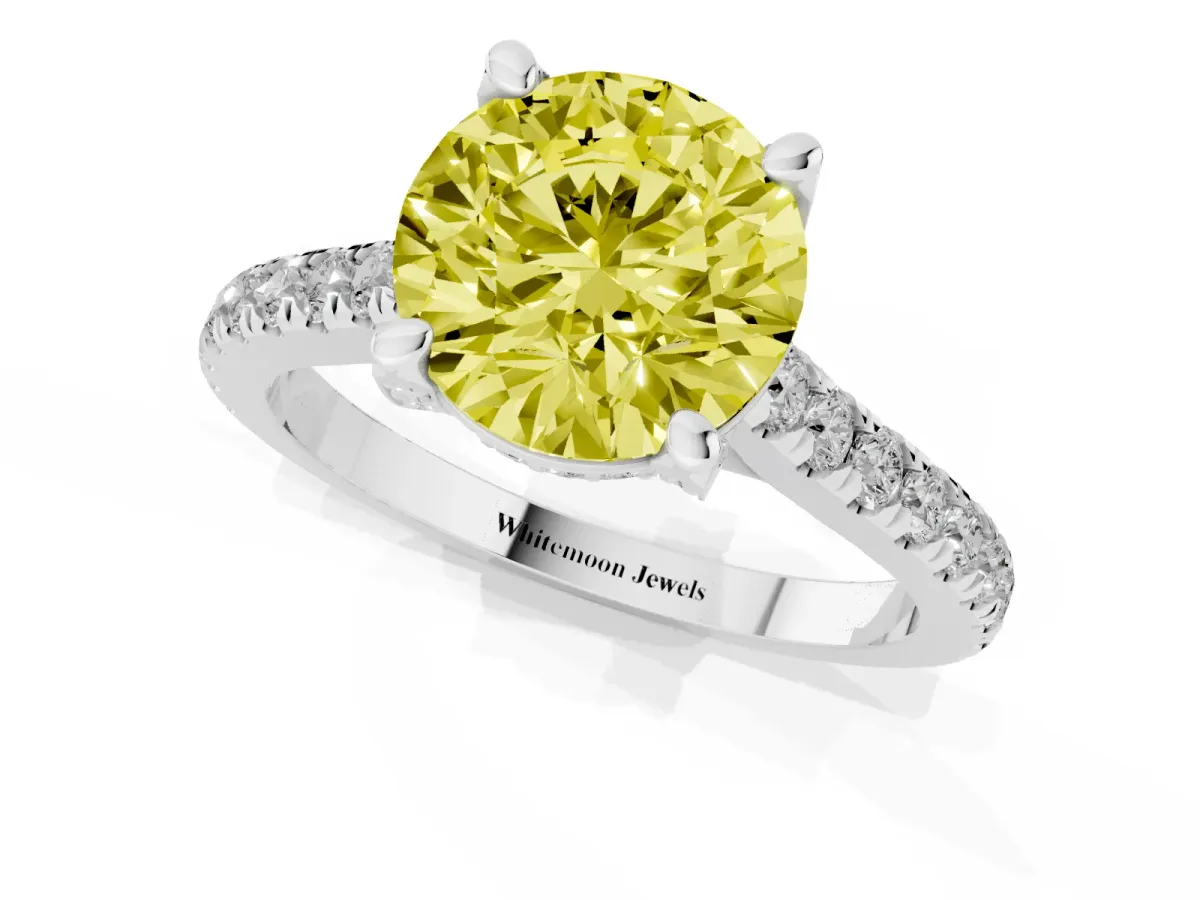 Fancy Yellow Round Cut Brilliant Diamond Solitaire with Pavé Band and Four-Prong Setting White gold