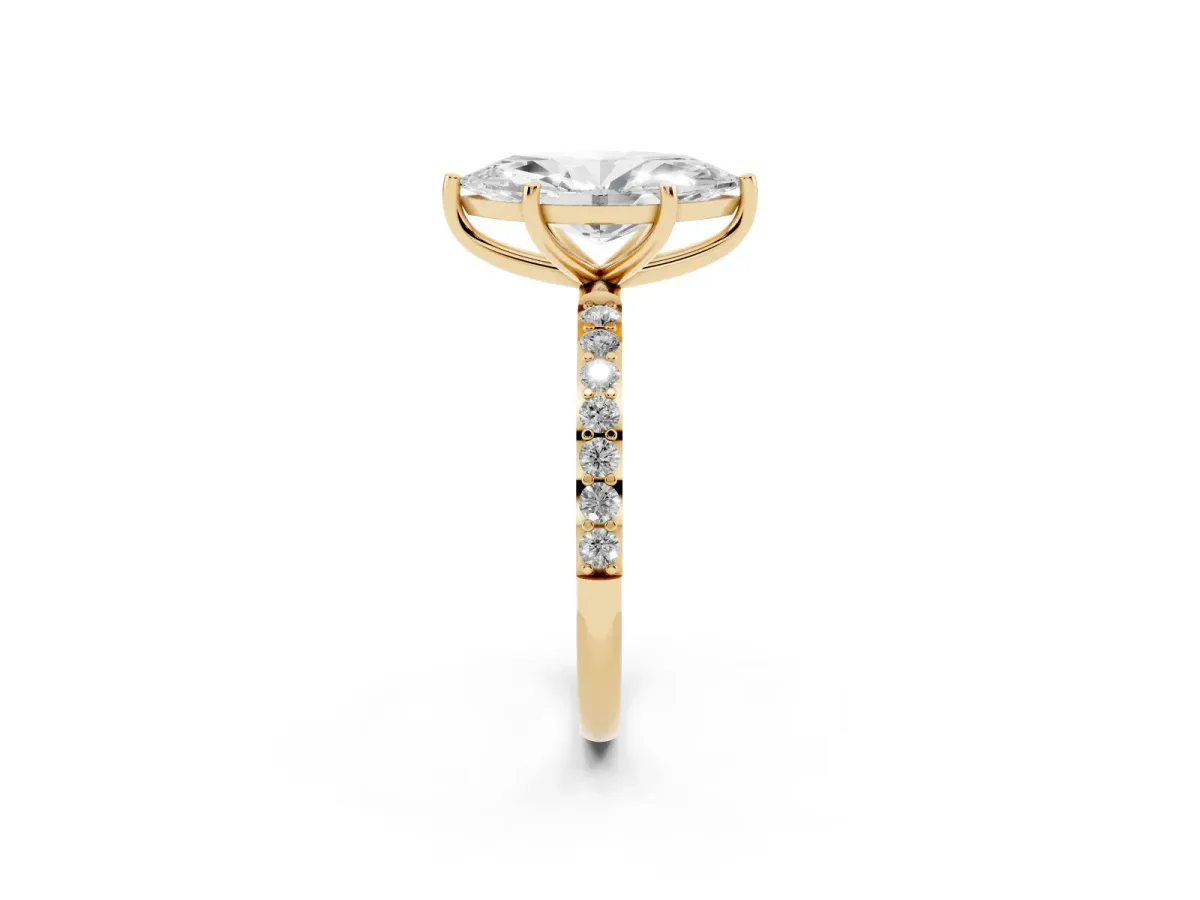 Marquise Cut Diamond Solitaire Ring with Round Pavé Shoulders and Prong Setting Yellow gold