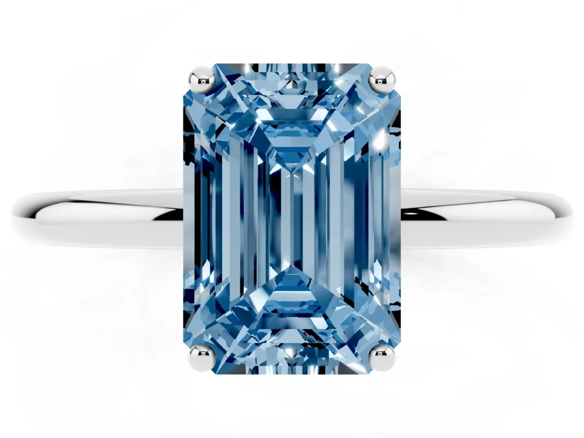 Fancy Blue Emerald Cut Solitaire Diamond Ring with a Classic Band and Four-Prong Setting Platinum