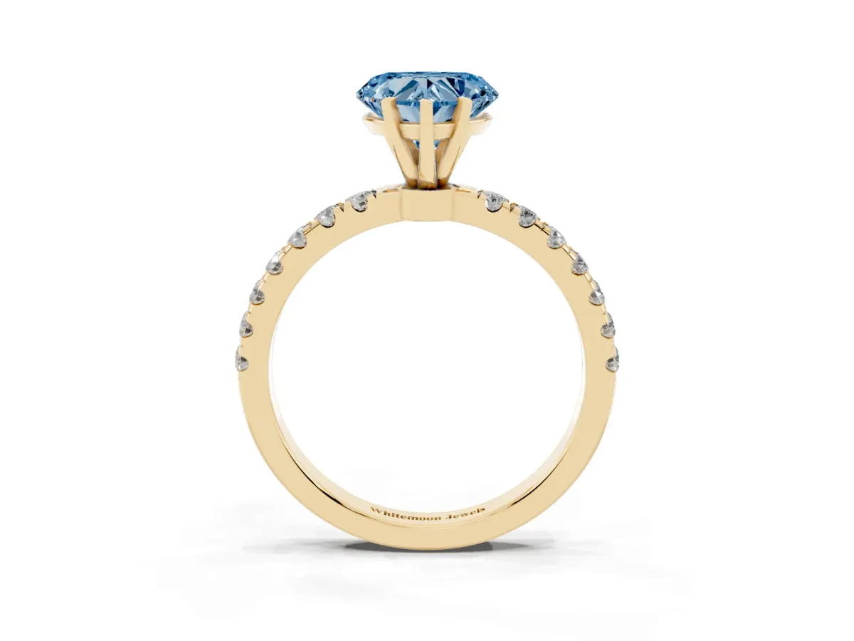 Fancy Blue Heart Cut Diamond Solitaire Ring with Pavé Accents and Four-Prong Setting Yellow gold