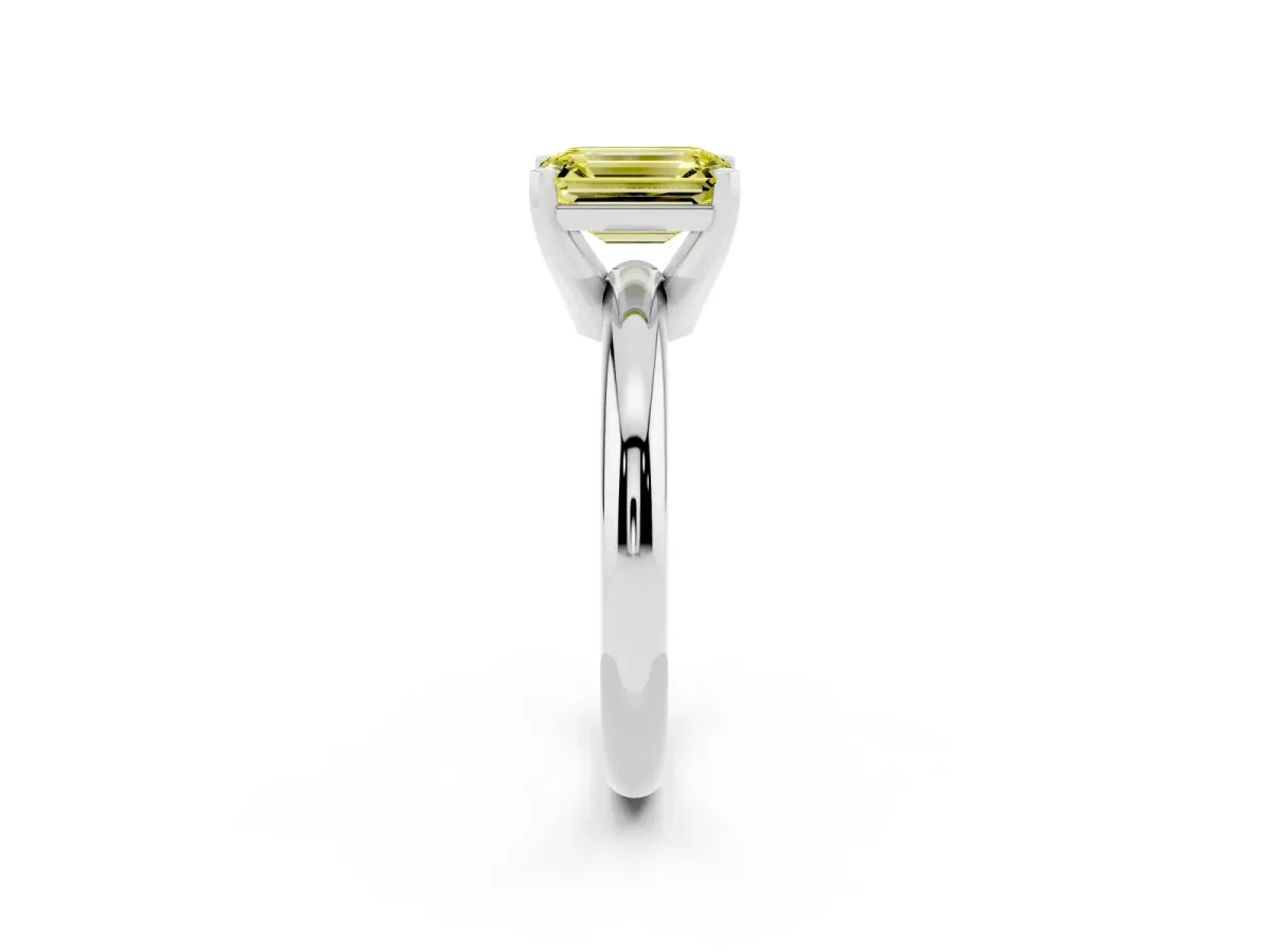 Fancy Yellow Emerald Cut Diamond Solitaire Engagement Ring with Round Band and Four-Prong Setting White gold
