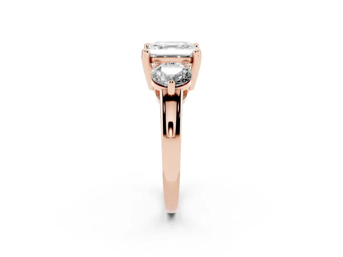 Three-Stone Asscher Cut Brilliant Cut Solitaire Ring with Prong Setting on a Classic Band Rose gold