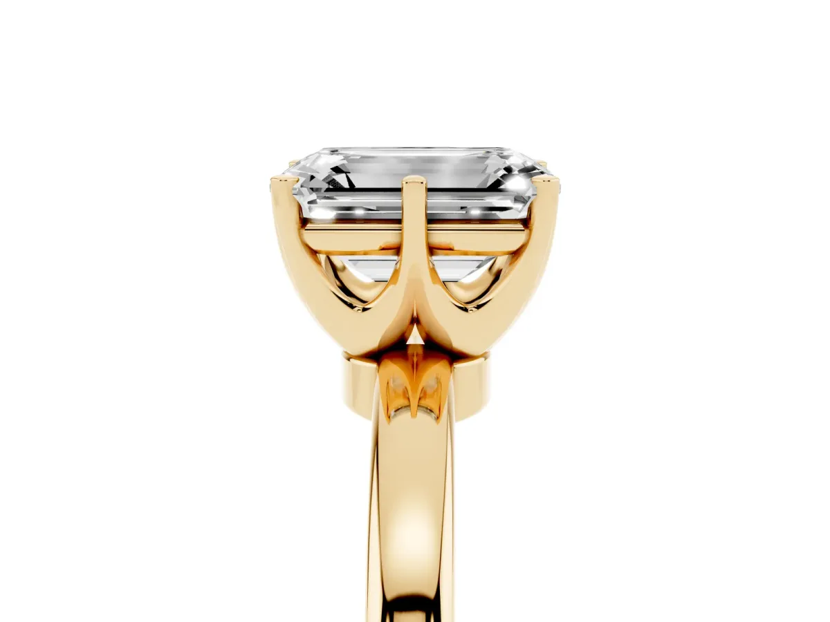 Emerald Cut Solitaire Diamond Ring with Six-Prong Setting on a Classic Band Yellow gold