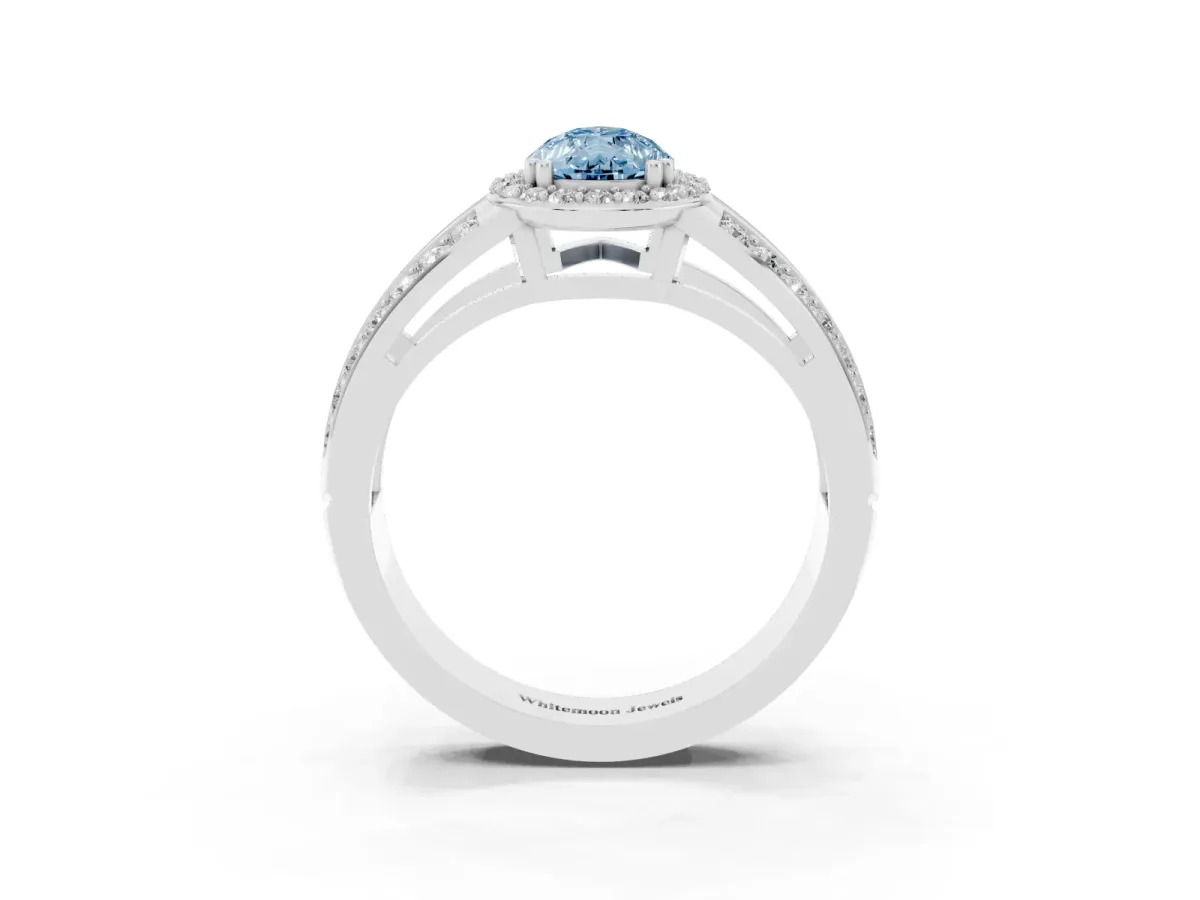 Fancy Blue Pear Cut Diamond Halo Ring with Split Shank Pavé Band and Four-Prong Setting White gold