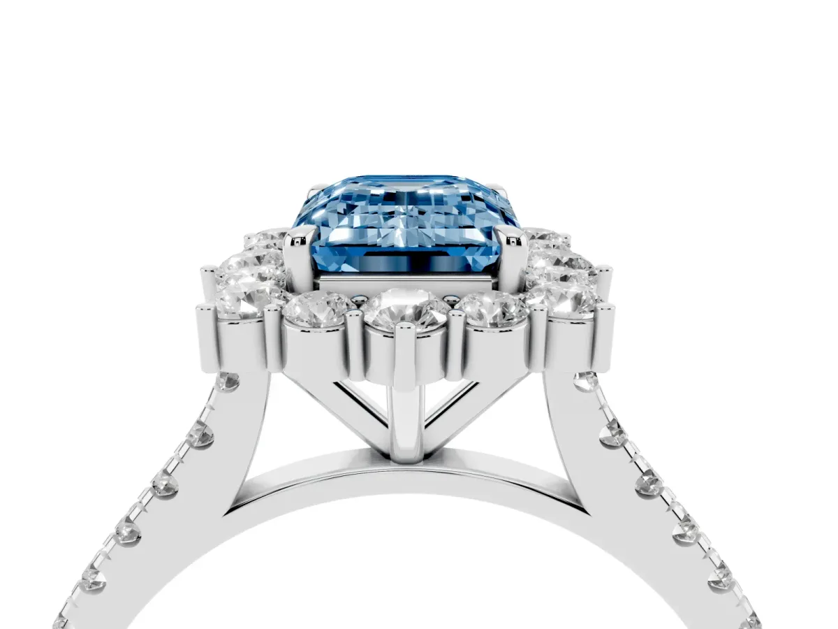 Fancy Blue Emerald Cut Halo Diamond Ring with Pavé Band and Prong Setting Silver