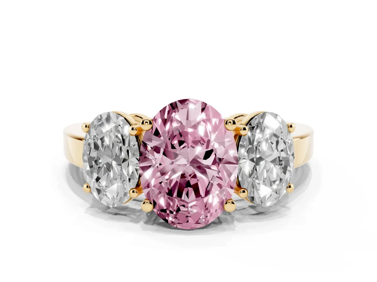 Fancy Pink Three-Stone Oval Cut Cut Diamond Engagement Ring with Flat Band and Four-Prong Setting Yellow gold