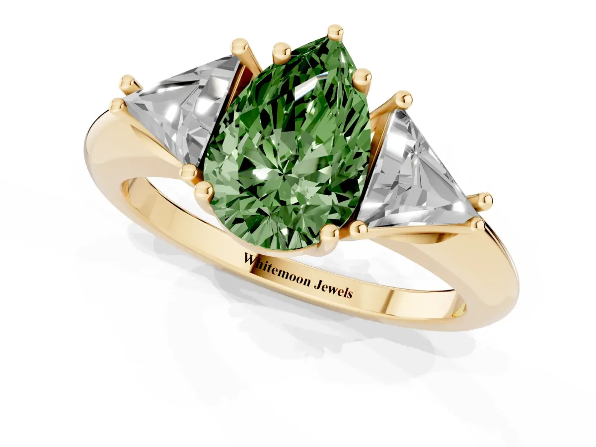 Fancy Green Three-Stone Pear Cut Diamond Engagement Ring with Trillion Side Stones and Prong Setting Yellow gold