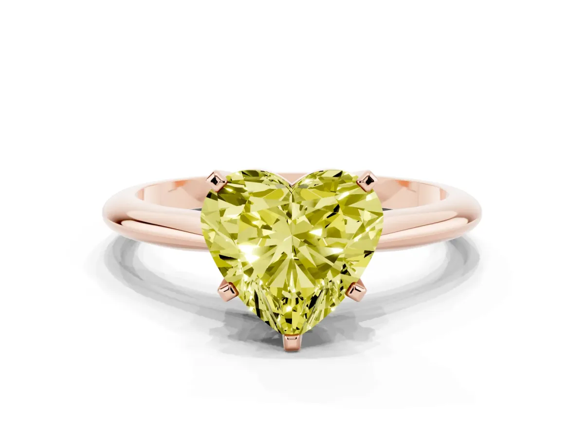 Fancy Yellow Heart Cut Cut Solitaire Ring with Four-Prong Setting on a Classic Band Rose gold