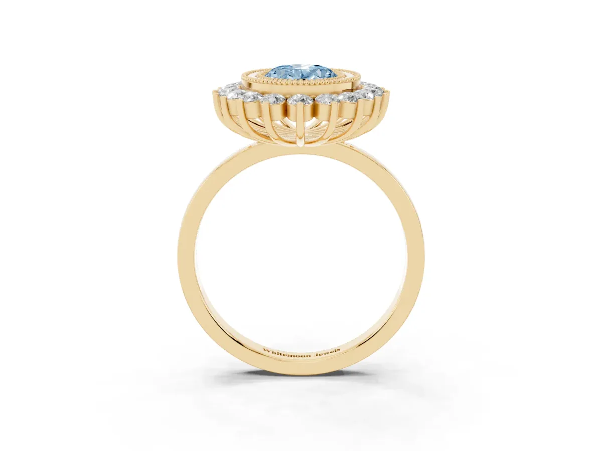 Fancy Blue Oval Cut Halo Diamond Ring with Milgrain Edge and Round Prong Setting Yellow gold