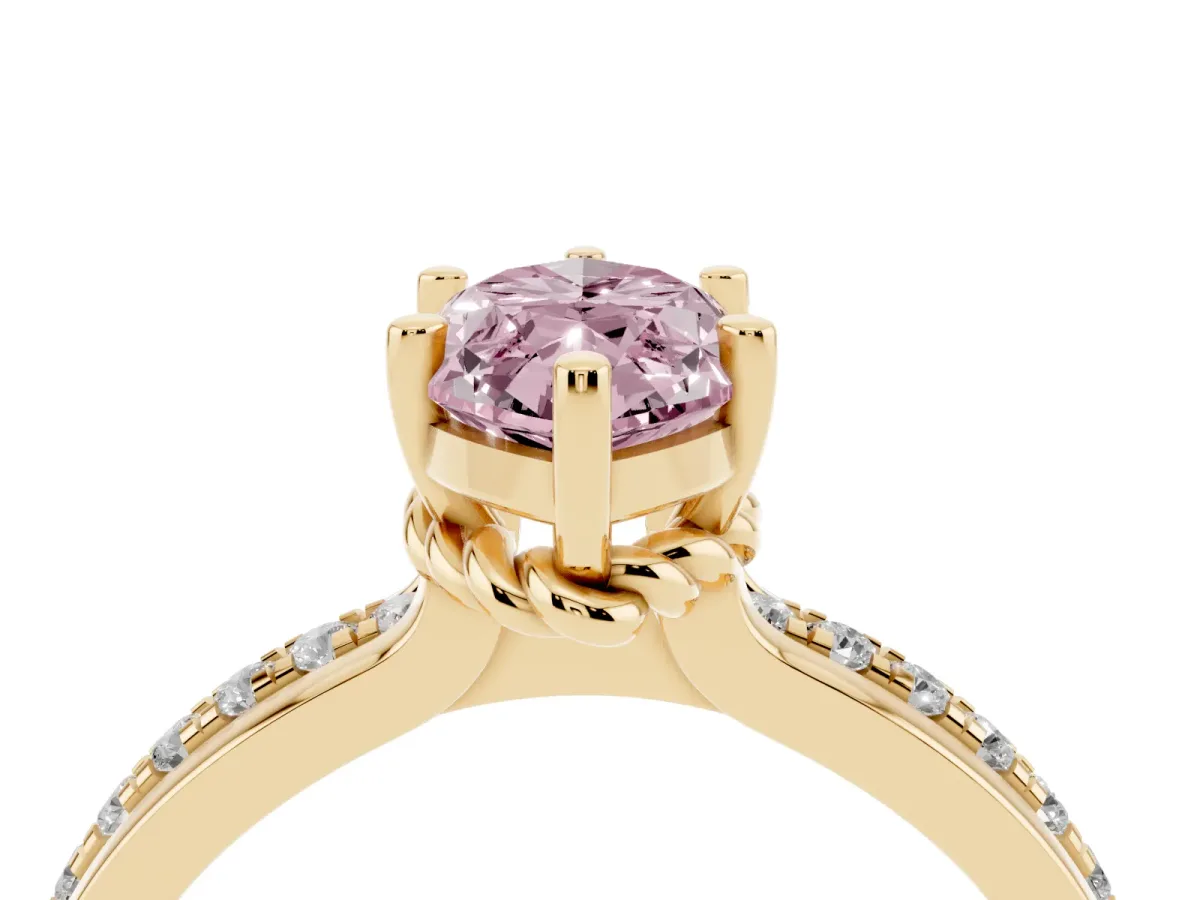 Fancy Pink Marquise Cut Solitaire Diamond Ring with Channel Set Band and Six-Prong Setting Yellow gold