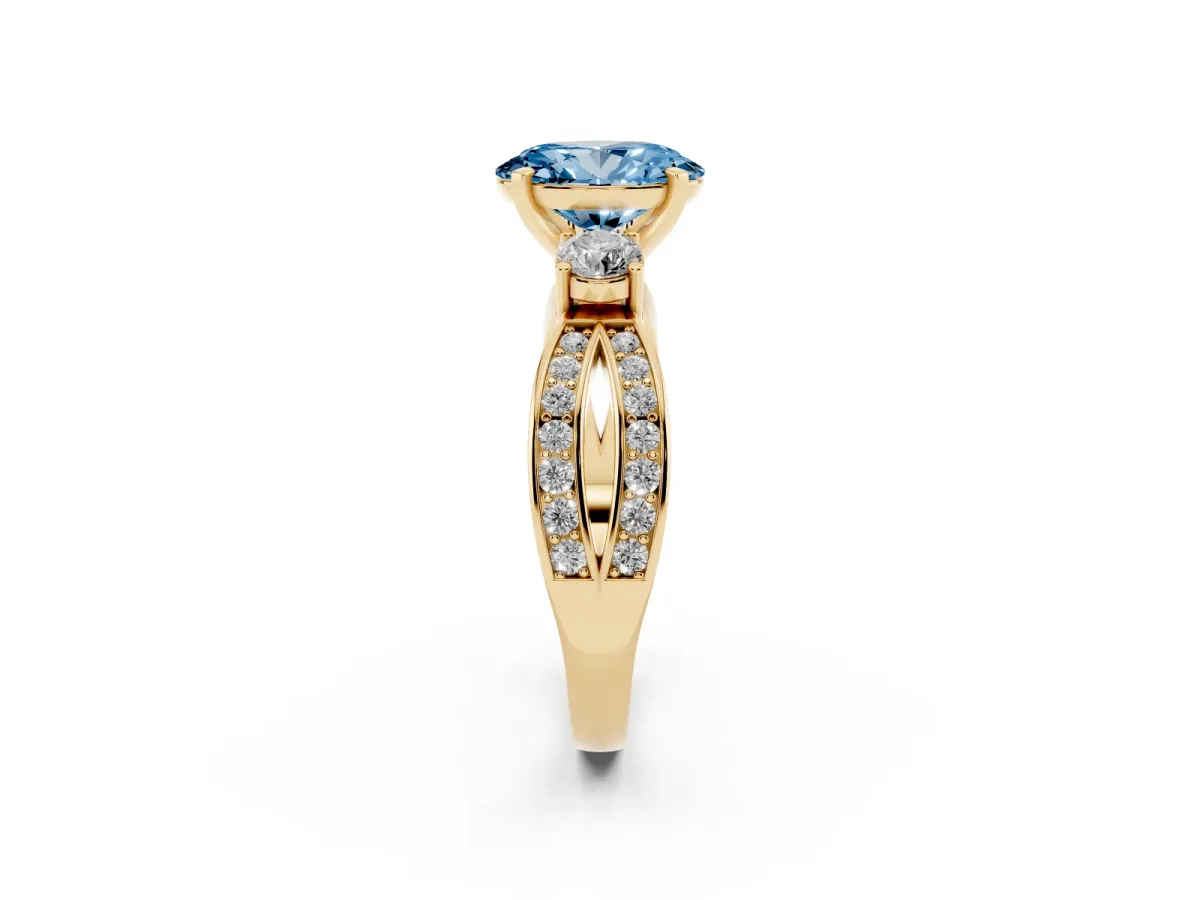 Fancy Blue Three-Stone Oval Cut Cut Diamond Twist Band with Prong Setting Yellow gold
