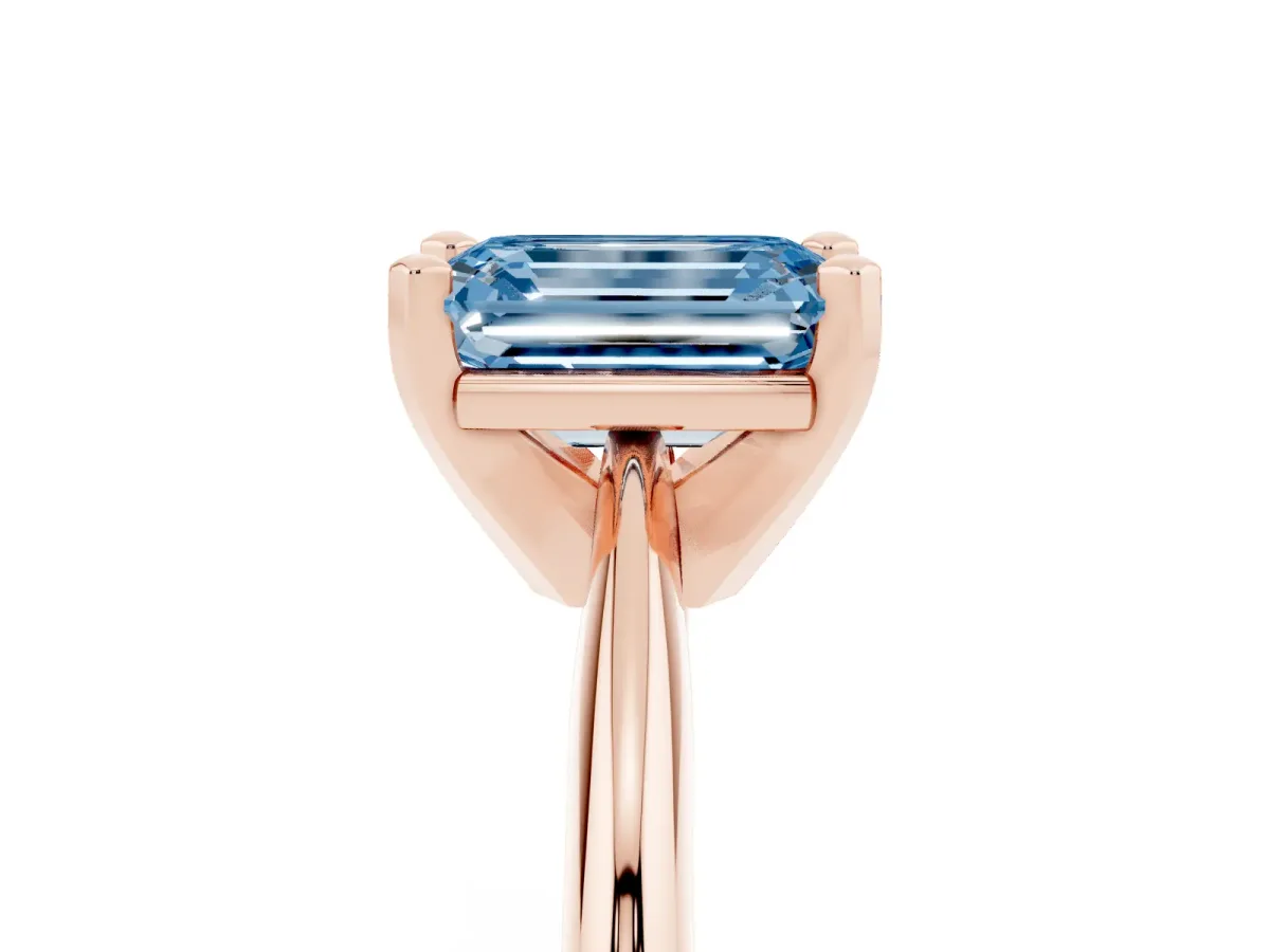 Fancy Blue Emerald Cut Cut Solitaire Ring with Four-Prong Setting on a Classic Band Rose gold