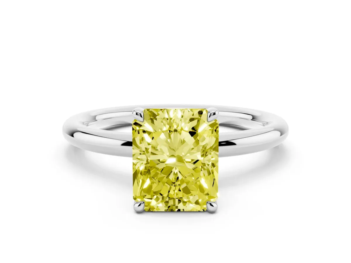 Fancy Yellow Radiant Cut Diamond Solitaire Ring with Thin Band and Four-Prong Setting Platinum