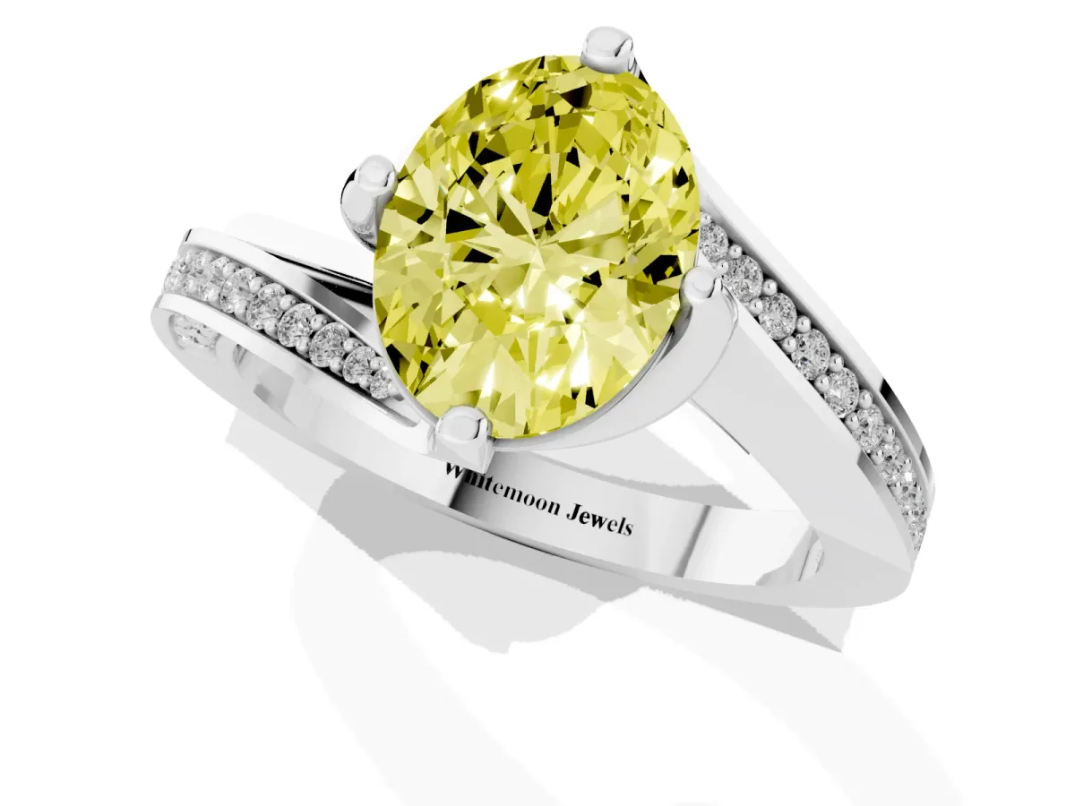 Fancy Yellow Oval Cut Solitaire Diamond Twist Band with Pavé Setting and Four-Prong Setting Platinum