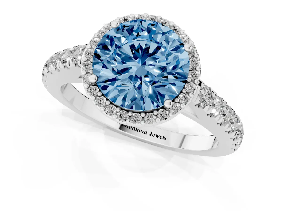 Fancy Blue Round Cut Cut Halo Diamond Engagement Ring with Pave Band and Four-Prong Setting Silver