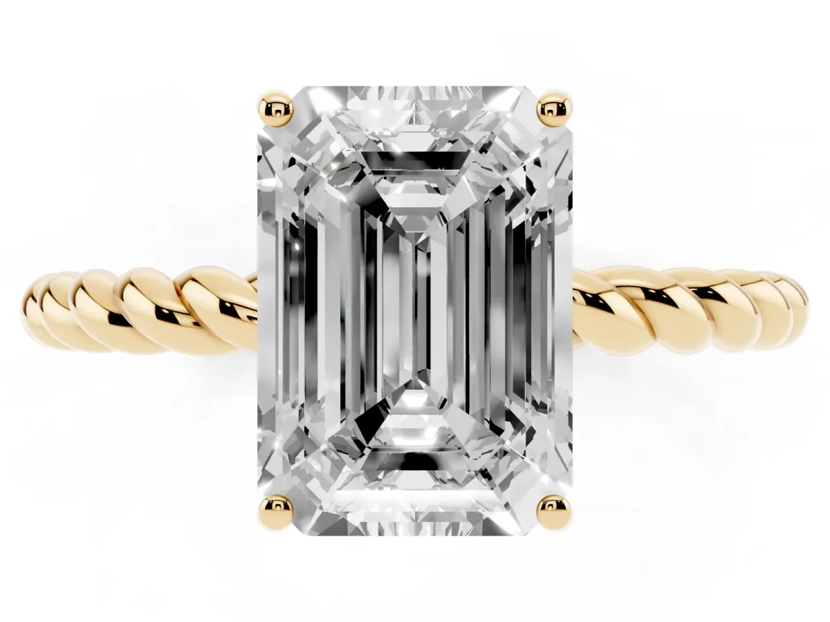 Emerald Cut Solitaire Twist Band Ring with Four-Prong Setting Yellow gold