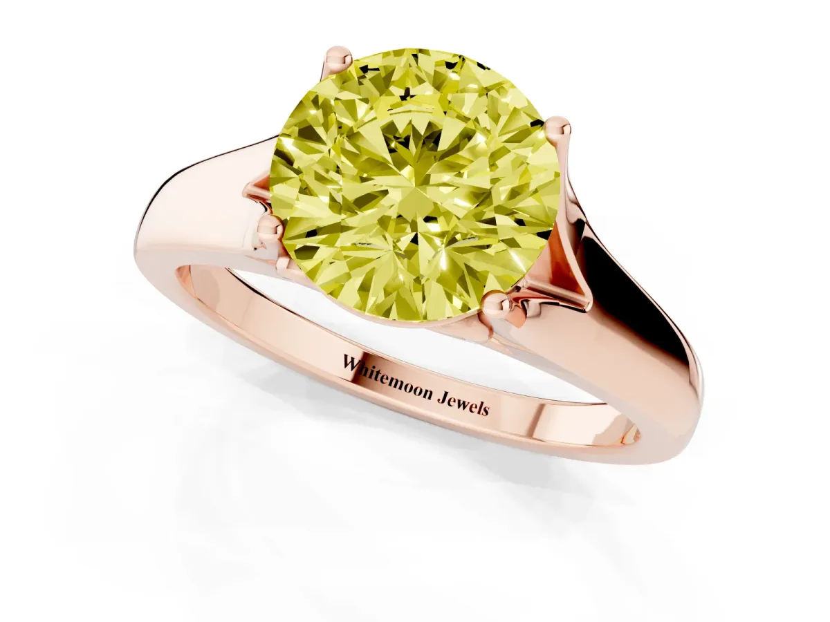 Fancy Yellow Round Cut Solitaire Diamond Ring with Cathedral Band and Four-Prong Setting Rose gold