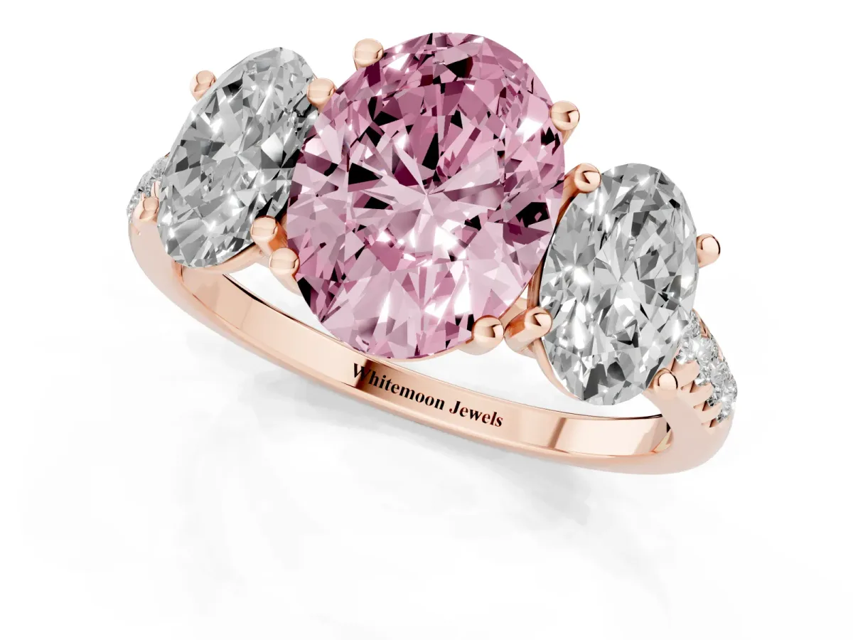 Fancy Pink Three-Stone Oval Cut Diamond Ring with Round Pavé Band and Prong Setting Rose gold