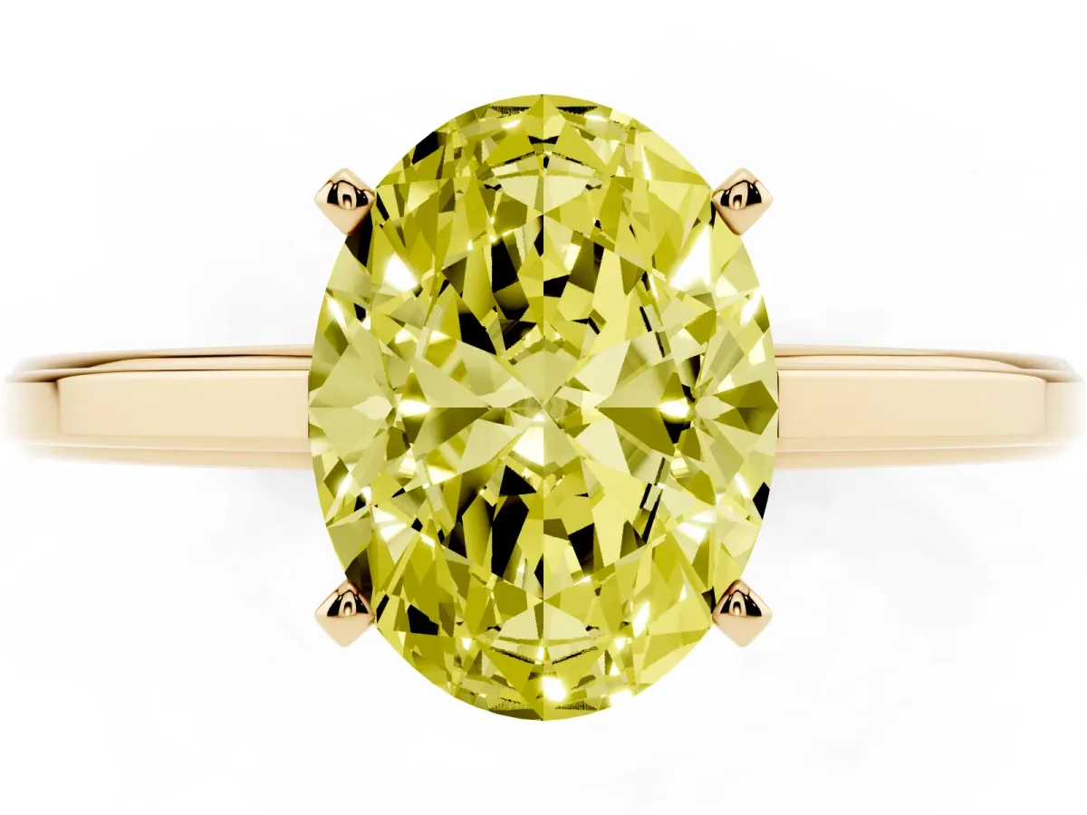 Fancy Yellow Oval Cut Solitaire Diamond Ring with Four-Prong Setting and Classic Band Yellow gold