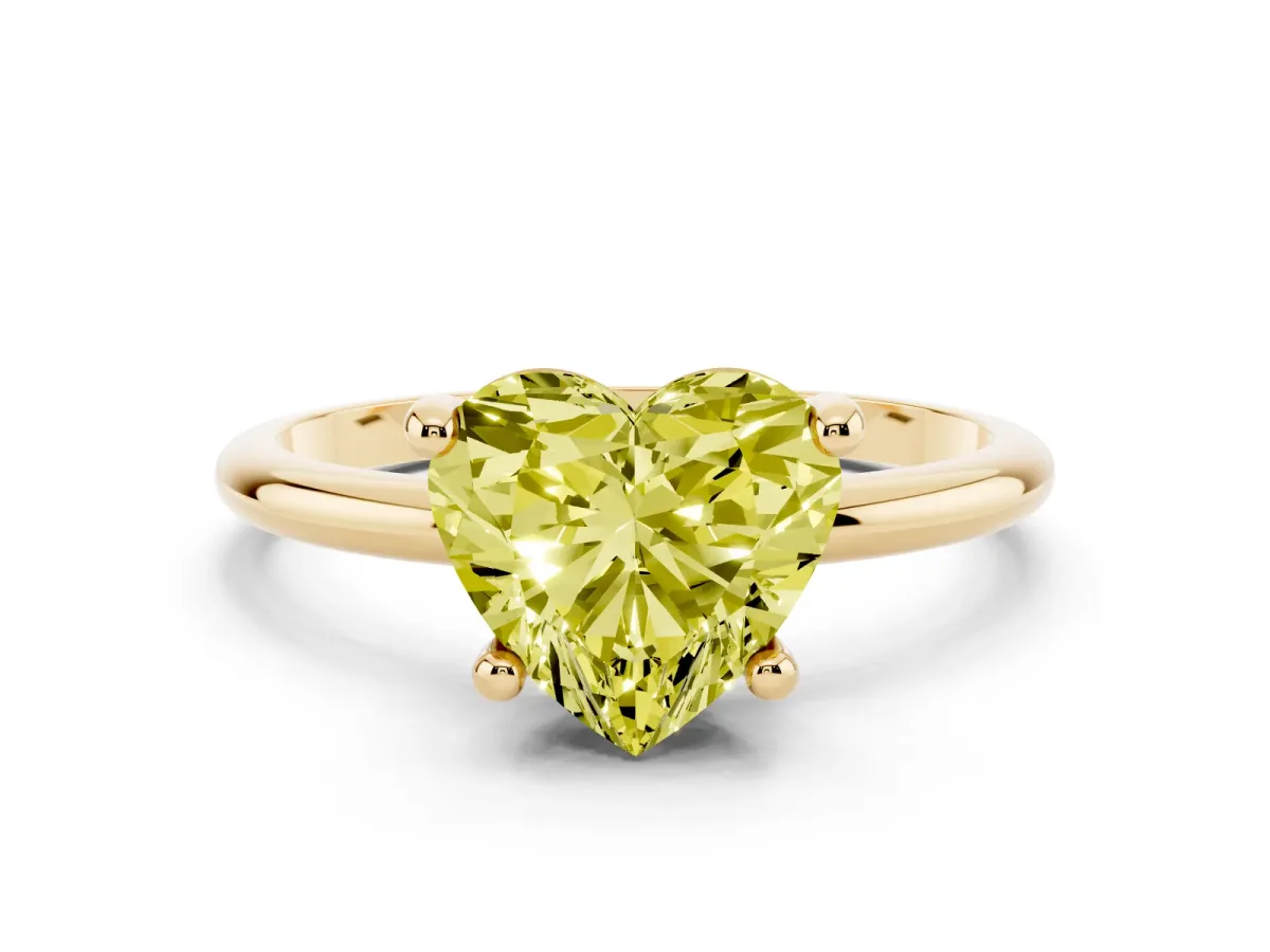 Fancy Yellow Heart Cut Solitaire Diamond Ring with 4-Prong Setting on a Classic Band Yellow gold