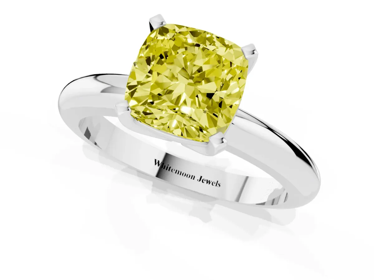 Fancy Yellow Cushion Cut Diamond Solitaire Engagement Ring with Round Band and Four-Prong Setting Platinum