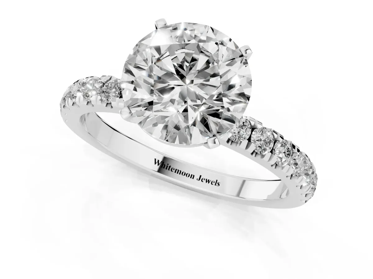 Round Cut Diamond Solitaire Ring with Pavé Accents and Four-Prong Setting Silver