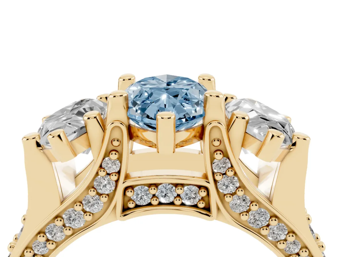Fancy Blue Marquise Cut Diamond Three-Stone Ring with Channel Set Band and Four-Prong Setting Yellow gold