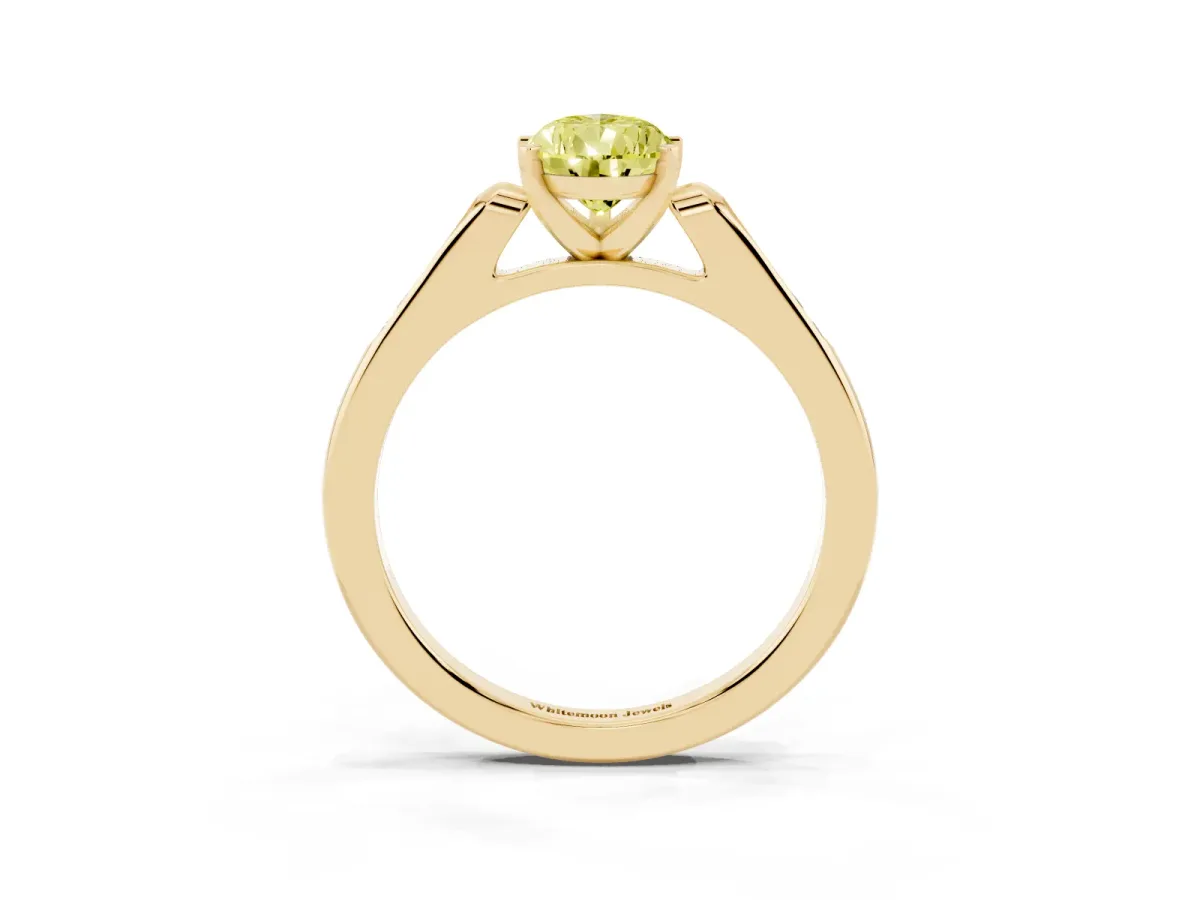 Fancy Yellow Pear Cut Diamond Solitaire Ring with Channel Set Round Band and Prong Setting Yellow gold