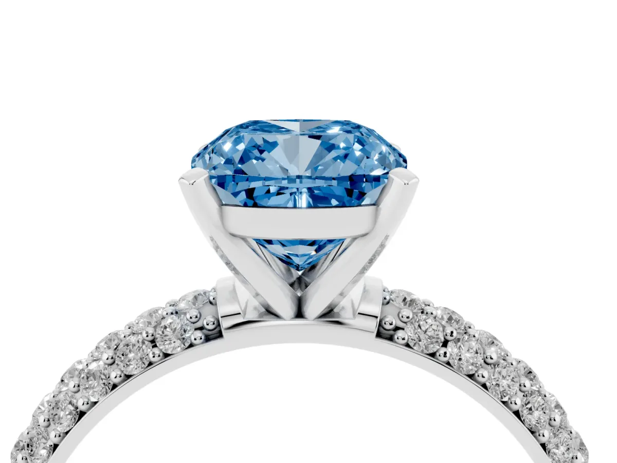Fancy Blue Cushion Cut Diamond Solitaire Ring with Prong Setting and Pavé Band Silver