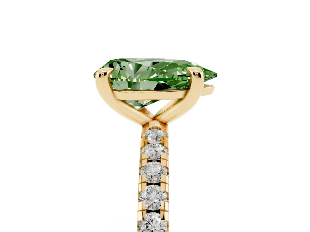 Fancy Green Pear Cut Diamond Brilliant Solitaire Ring with Pavé Band and Four-Prong Setting Yellow gold