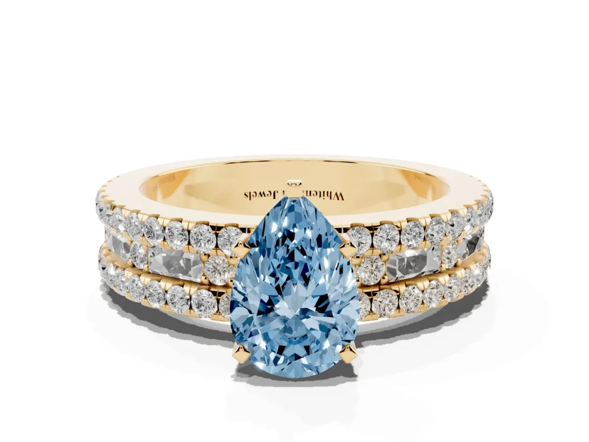 Fancy Blue Pear Cut Diamond Solitaire Ring with Pavé and Channel Set Band Yellow gold