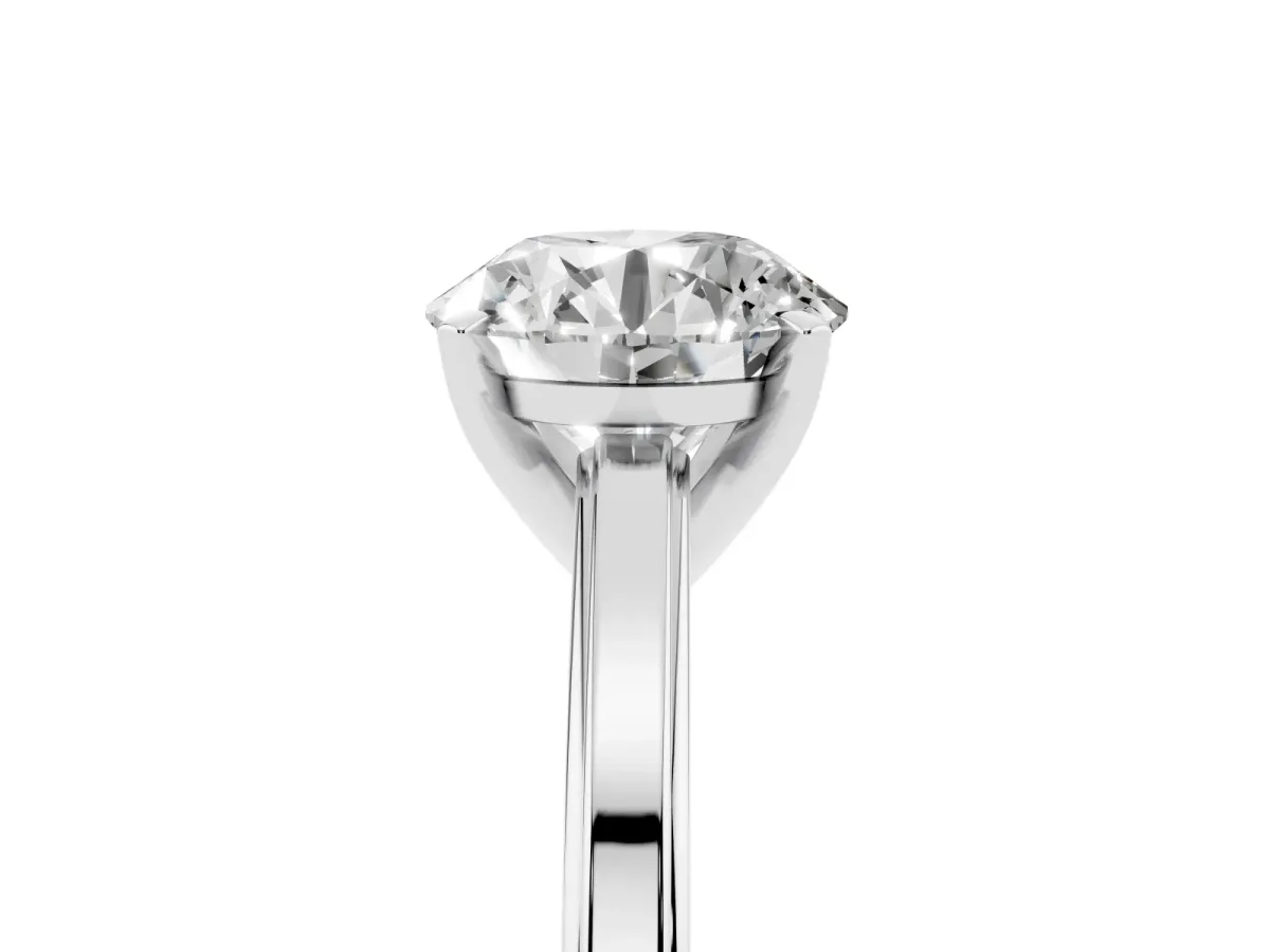 Round Cut Solitaire Diamond Ring with Four-Prong Setting and Classic Band Platinum