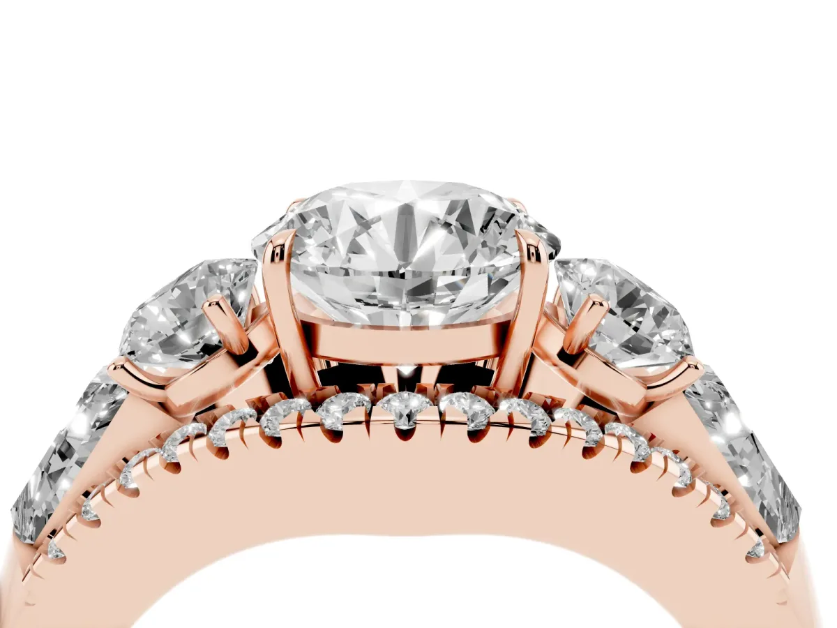 Three-Stone Round Cut Diamond Engagement Ring with Pave Band and Prong Setting Rose gold