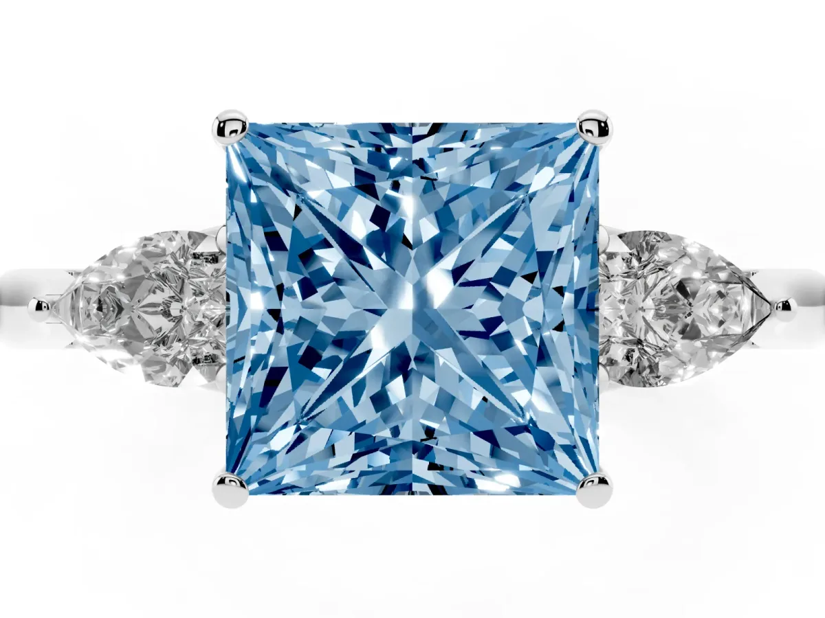 Fancy Blue Three-Stone Princess Cut Diamond Ring with Pear Side Stones in Four-Prong Setting Silver