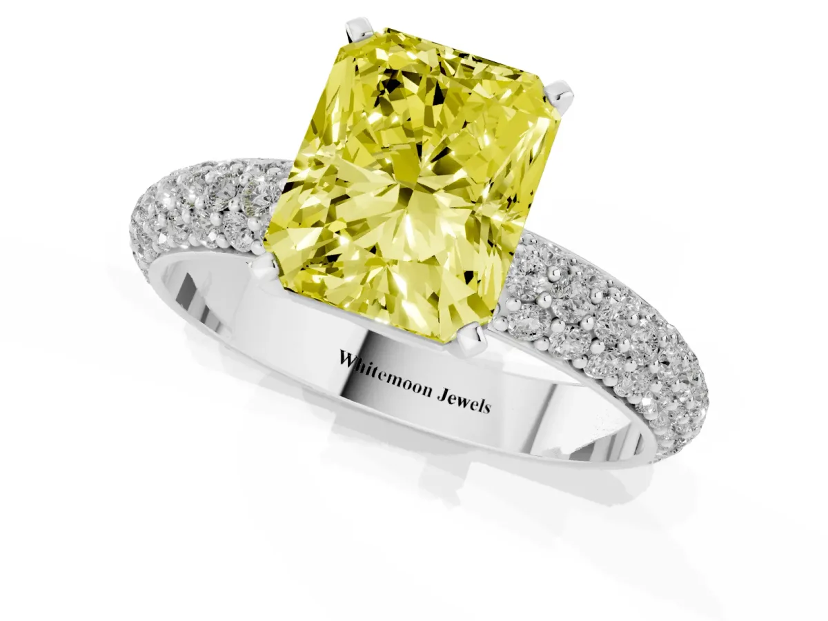 Fancy Yellow Radiant Cut Diamond Solitaire Ring with Prong Setting and Pavé Band Silver