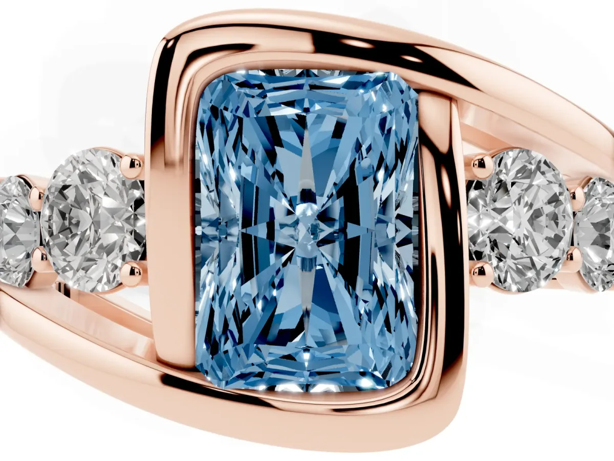 Fancy Blue Bezel Set Radiant Cut Diamond Bypass Ring with Round Accents Rose gold