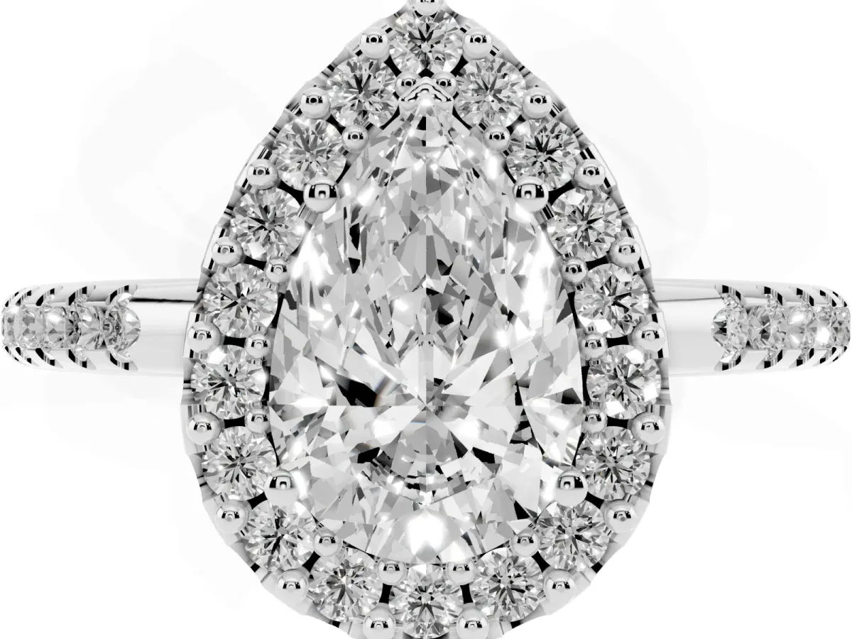 Pear Cut Diamond Pavé Halo Ring with Four-Prong Setting Platinum