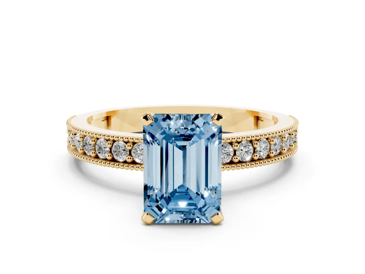 Fancy Blue Emerald Cut Diamond Milgrain Pavé Engagement Ring with Four-Prong Setting Yellow gold