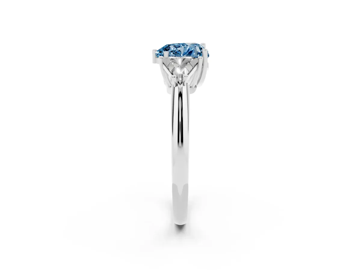 Fancy Blue Three-Stone Heart Cut Diamond Engagement Ring with Trillion Side Stones and Prong Setting Silver