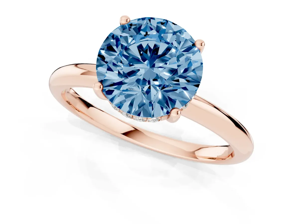 Fancy Blue Round Cut Cut Solitaire Engagement Ring with Four-Prong Setting and Classic Band Rose gold