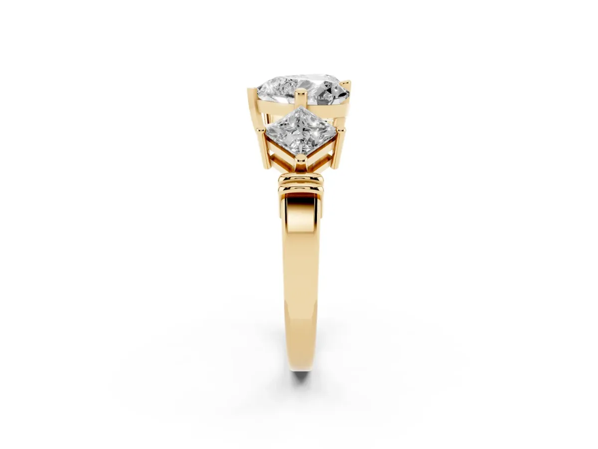 Three-Stone Heart Cut and Princess Cut Diamond Ring with Channel Band and Four-Prong Setting Yellow gold