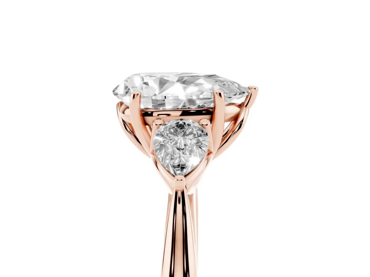 Pear Cut Diamond Three-Stone Ring with Pear Side Stones and Prong Setting Rose gold