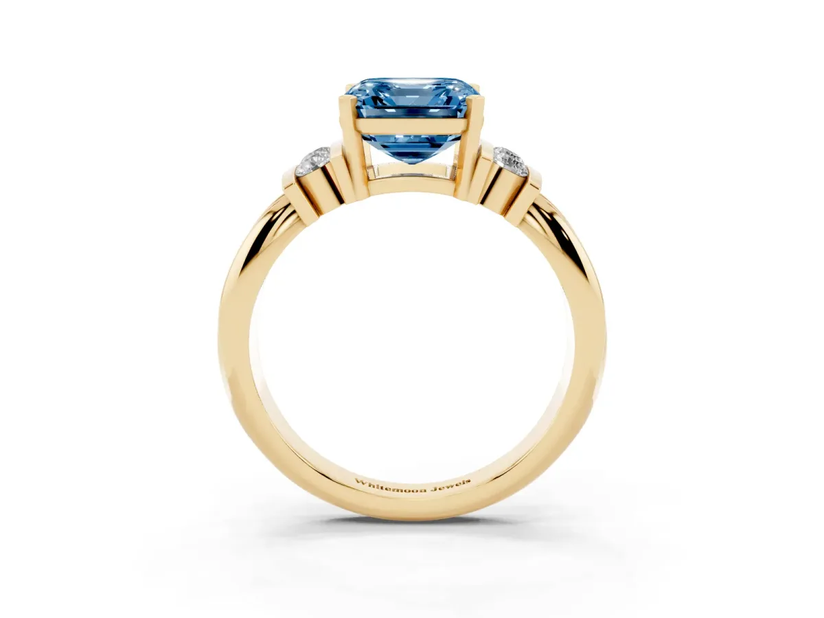 Fancy Blue Asscher Cut Cut Three-Stone Channel Set Ring with Bar Prongs Yellow gold