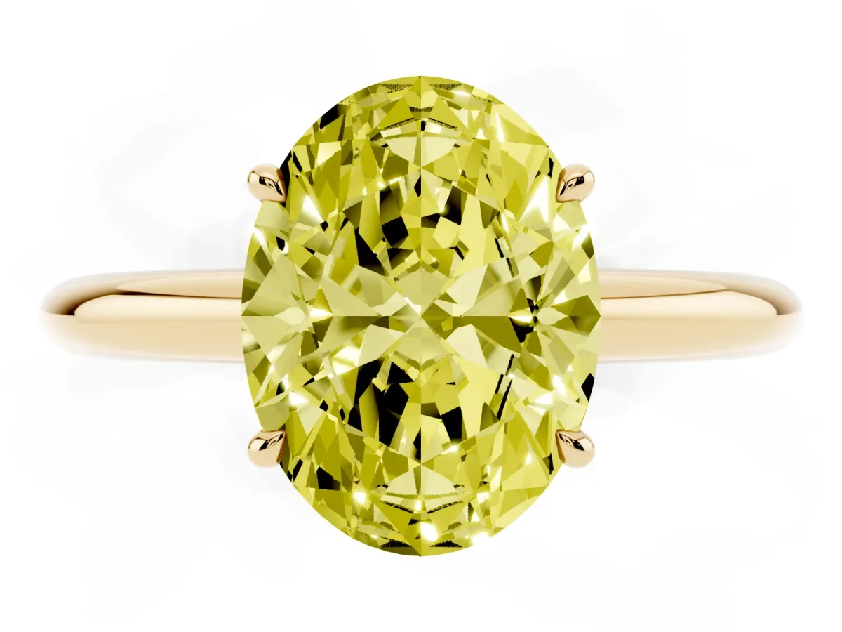 Fancy Yellow Oval Cut Brilliant Solitaire Engagement Ring with Six-Prong Setting and Classic Band Yellow gold