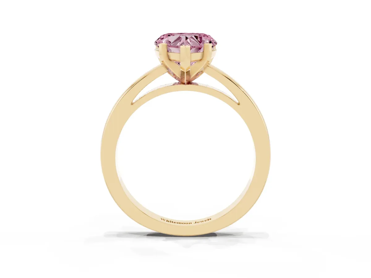 Fancy Pink Heart Cut Solitaire Diamond Engagement Ring with Four-Prong Setting on a Classic Band Yellow gold