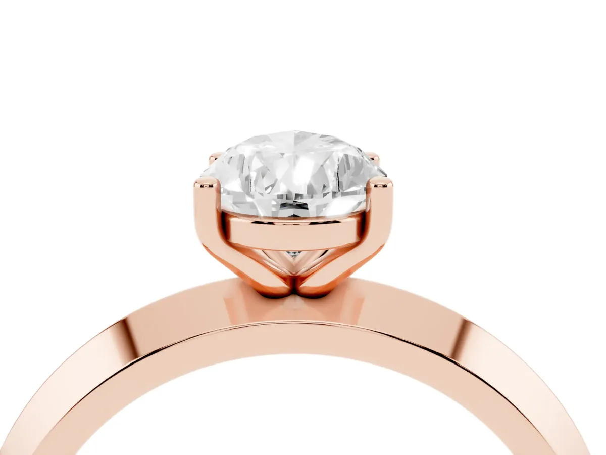 Pear Cut Cut Solitaire Engagement Ring with Flat Band and Four-Prong Setting Rose gold