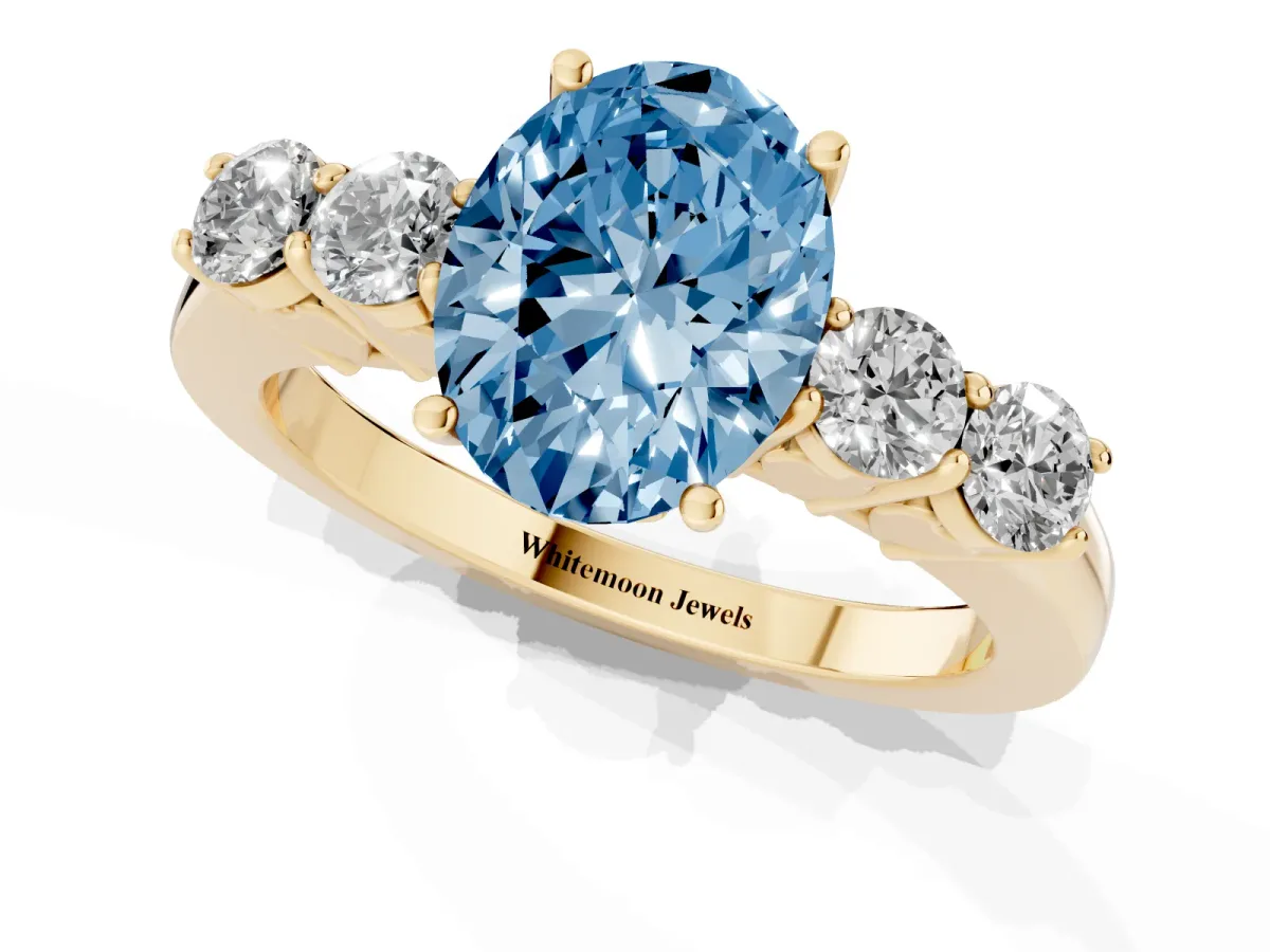 Fancy Blue Oval Cut Cut Diamond Five-Stone Prong Set White Gold Ring Yellow gold