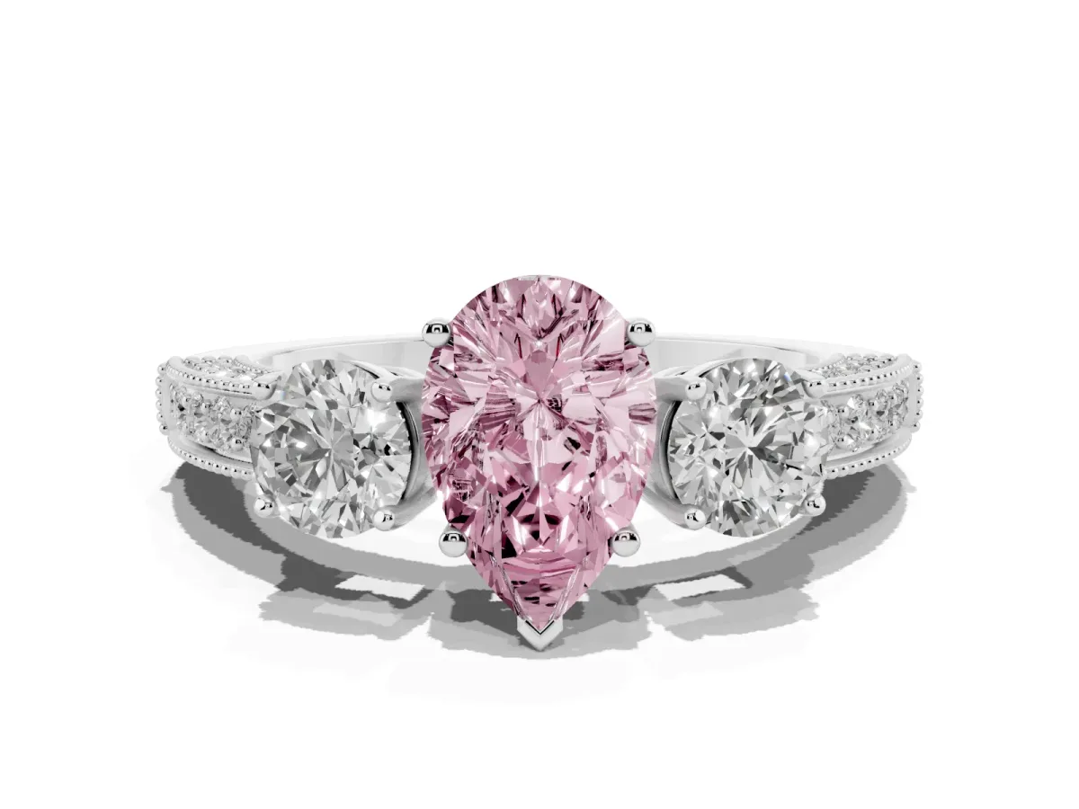Fancy Pink Pear Cut Three-Stone Diamond Ring with Pavé Band and Four-Prong Setting Silver