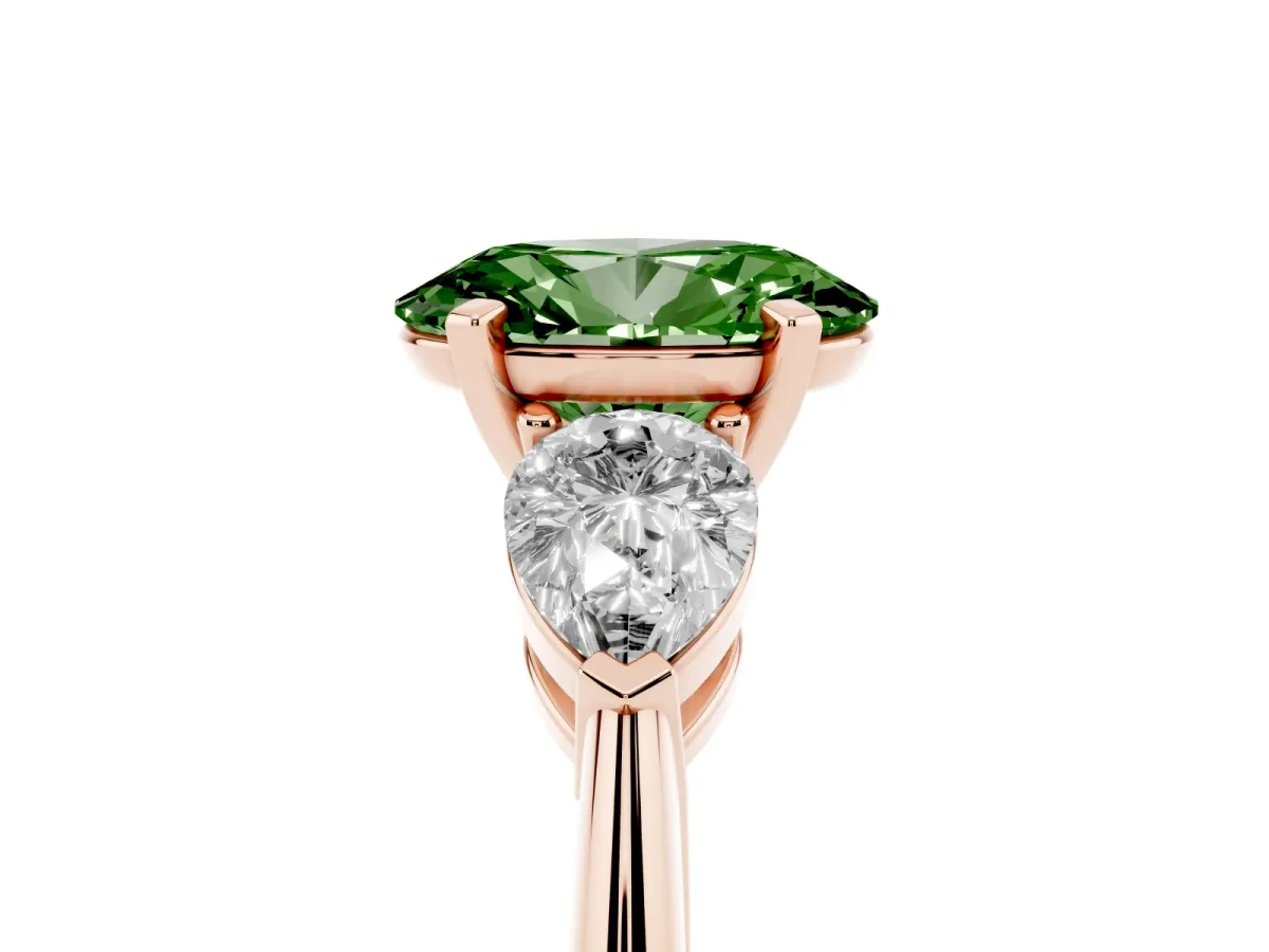 Fancy Green Three-Stone Oval Cut Diamond Ring with Pear Side Stones and Four-Prong Setting Rose gold